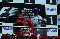 Juan Pablo wins the podium battle of the champagne. Image by BMW. Click here for a larger image.