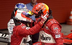 Rubens Barrichello congratulates Michael Schumacher in San Marino. Image by Ferrari.