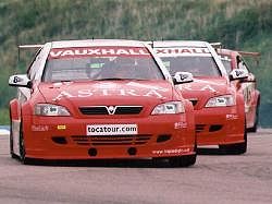 Yvan Muller won the Feature race in his Vauxhall Astra Coupe, but did not finish the Sprint race - here he leads Thompson. Image by Kelvin Fagan. Click here for a larger image.