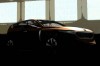 Kia crossover teased. Image by Kia.