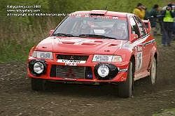 7th place: Katsuhiko Taguchi and Derek Ringer in the Mitsubishi Lancer. Image by Mark Sims. Click here for a larger image.