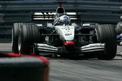 DC proved his mettle to hold off Schumacher in his slower McLaren. Image by McLaren. Click here for a larger image.