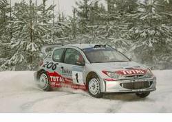 Richard Burns, Peugeot 206 WRC 2002, 4th place. Image by Peugeot. Click here for a larger image.