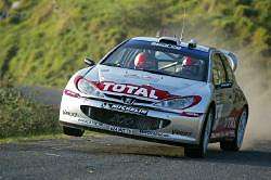 Richard Burns, Peugeot 206 WRC, 4th place. Image by Peugeot. Click here for a larger image.