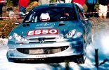 Peugeot celebrate their first 206WRC victory