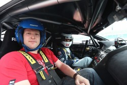 Passenger ride in the 2012 Aston Martin Vantage GT4. Image by Aston Martin.