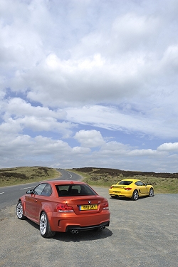 2011 BMW 1 Series M Coup vs. Porsche Cayman R. Image by Max Earey.