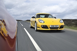 2011 BMW 1 Series M Coup vs. Porsche Cayman R. Image by Max Earey.