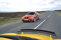 2011 BMW 1 Series M Coup vs. Porsche Cayman R. Image by Max Earey.