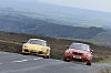 2011 BMW 1 Series M Coup vs. Porsche Cayman R. Image by Max Earey.