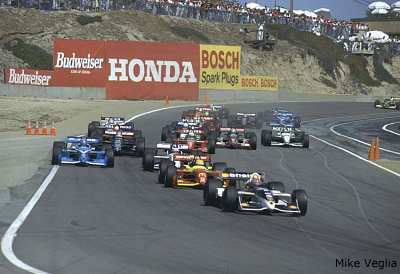 The field on the opening lap coming down to the Andretti
Hairpin (turn 2)