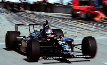 Michael Andretti leaves the pits after receiving service. Michael L. Levitt / LAT Photographic