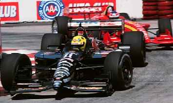 1999 CART Long Beach G.P. - Long Beach, California, USA April 18, 1999 Ford driver Christian Fittipaldi holds off a charge from Jimmy Vasser. - Michael L. Levitt, USA LAT Photographic
