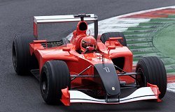 Michael Schumacher races without sponsor logos in the aftermath of September 11th 2001. Image by Eileen Buckley.