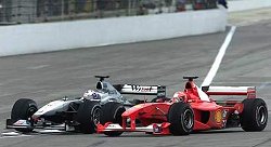 Wheel to wheel action between Coulthard and Schumacher at the 2000 US GP. Image by Eileen Buckley.