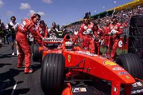 Michael finalises the car's settings on the grid