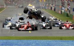The dramatic first corner incident wiped out about half of the grid. Image by Ferrari. Click here for a larger image.