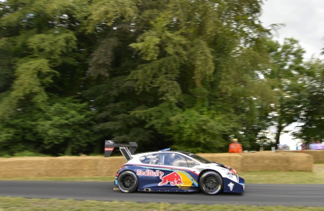 Loeb wins 2014 Goodwood hillclimb. Image by Peugeot.