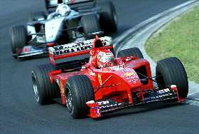 Coulthard hounded Irvine and finally forced him into an error