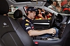 Sebastian Vettel tries out the latest Infiniti models in Shanghai. Image by Infiniti.