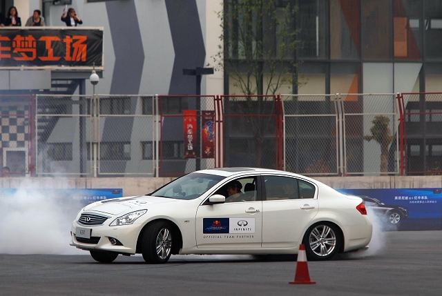 Vettel takes Infiniti for a spin. Image by Infiniti.