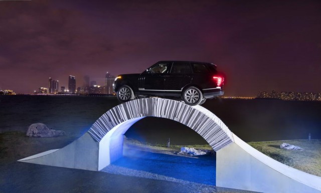 Range Rover crosses paper bridge. Image by Land Rover.