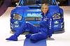 New Subaru Impreza WRC car for 2003 (erm, behind the lovely lady... Photograph by Mark Sims. Click here for a larger image.