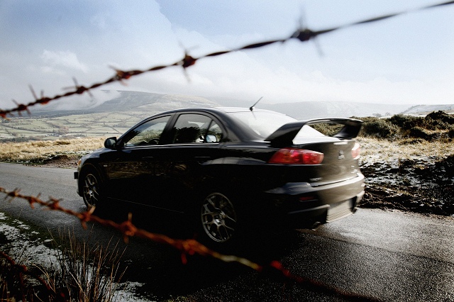 Evo X on track. Image by Mitsubishi.