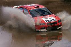 The new Lancer WRC took to the gravel in Australia. Makinen is still a title contender. Picture by Mitsubishi.