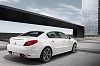 Wraps come off Peugeot's Mondeo rival. Image by Peugeot.