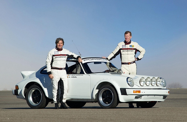 Rohrl reunited with 911 racer. Image by Porsche.