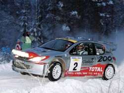 Didier Auriol in the Peugeot 206. Photograph by Robert Chambers.