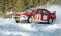 Freddy Loix in the Mitsubishi Carisma. Photograph by Robert Chambers.