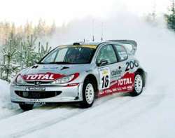 Harri Rovanpera in the Peugeot 206. Photograph by Robert Chambers.