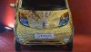 2011 Tata Nano - in gold. Image by ITN.