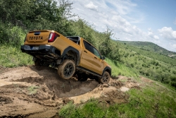 Which truck to go for - the one with a diesel engine, or the all-electric newbie? Image by Toyota.