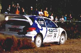 You better appreciate this picture of Delecour in the Peugeot - Neil got pelted by the stones to get it!!!